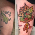Recouvrement de tatouage en style New School couleur représentant un coucou suisse sur la cuisse – Jake Tattoo Parlor à Belfort.